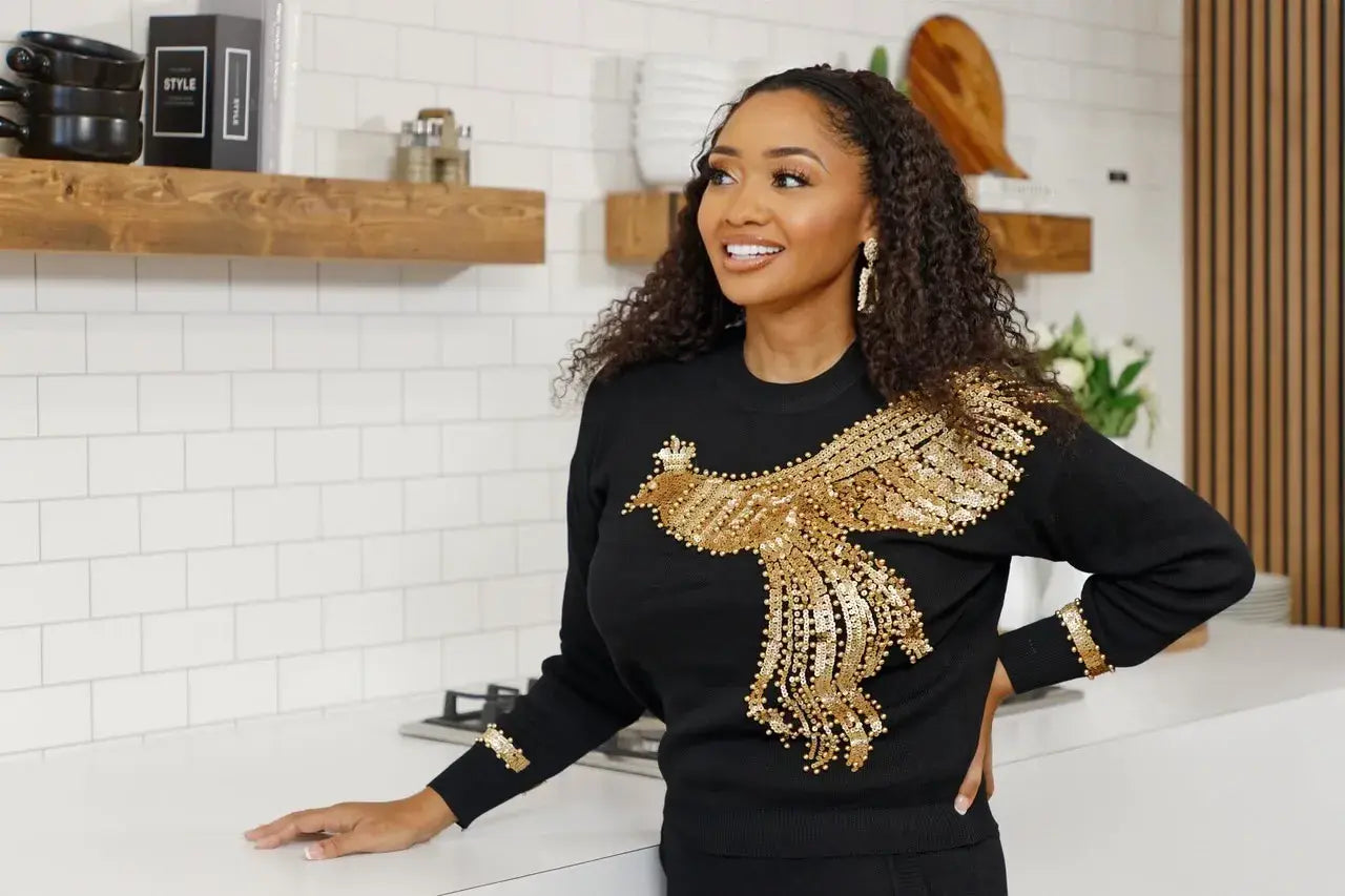 Model wearing Easy Headband Wig with deepwave curls, showcasing a quick and stylish hair solution in a casual kitchen setting.