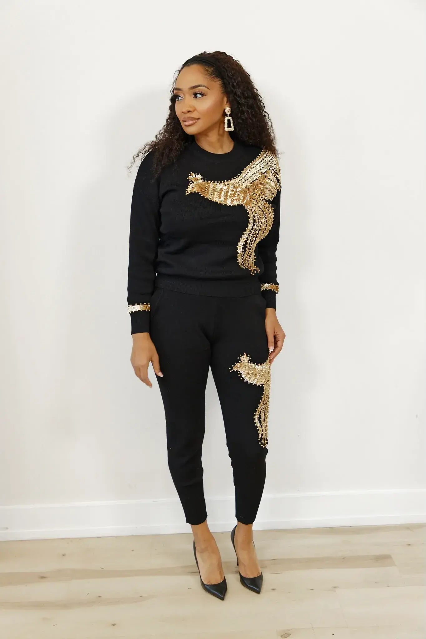 Full-body view of model in black outfit wearing Easy Headband Wig, demonstrating a stylish and convenient hair solution.