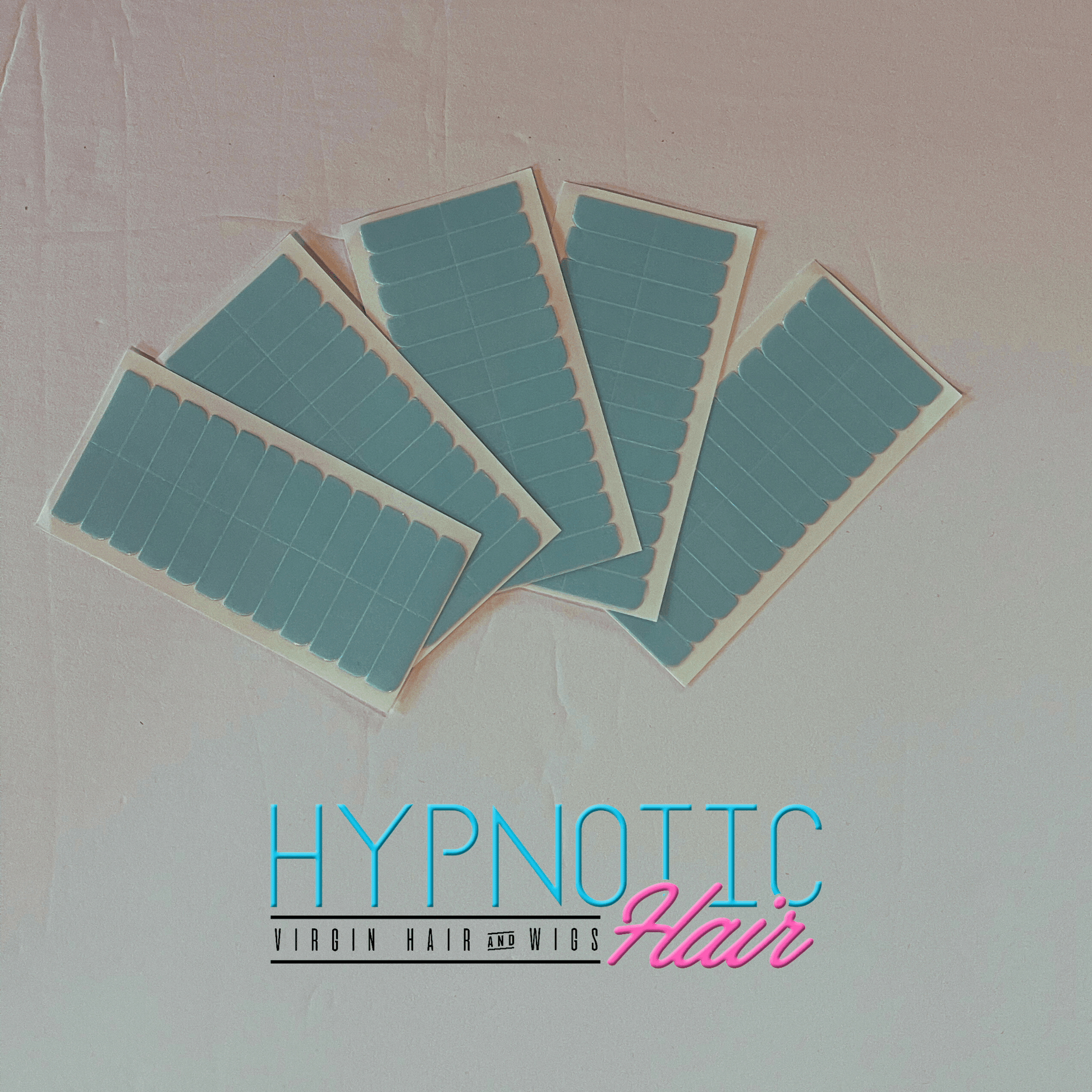 Easy Use Tape-In Adhesive strips for secure extensions, shown in five sheets with blue backing. Convenient and removable for tape-in hair systems.