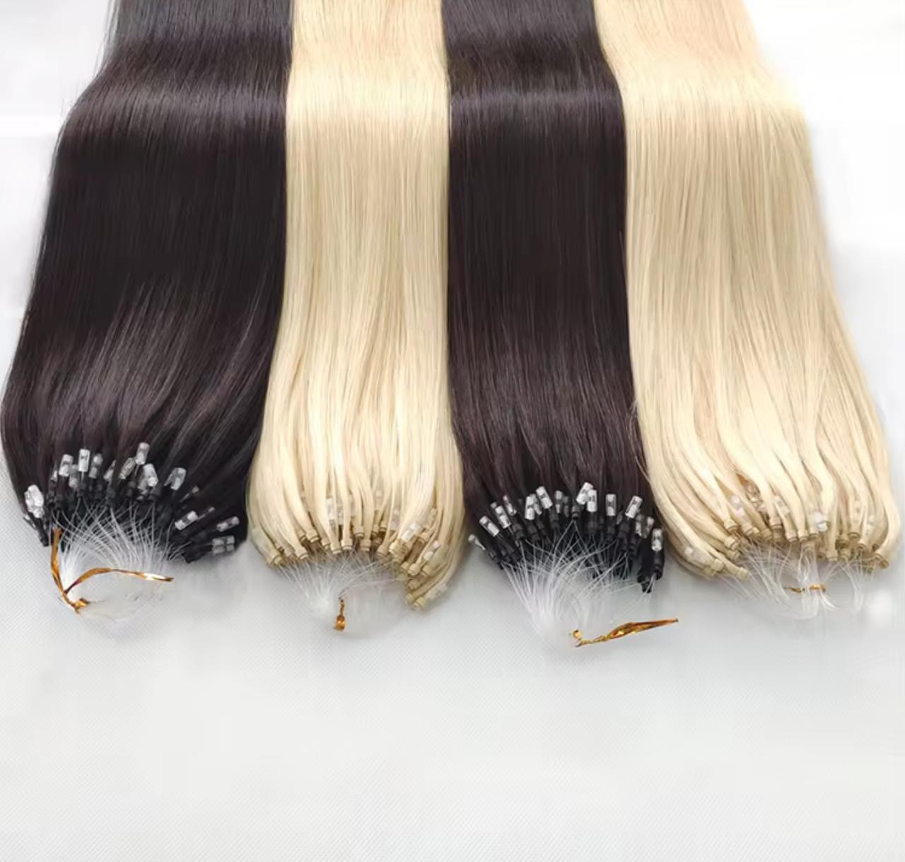 Variety of Hypnotic Virgin seamless micro-link extensions in black and blonde tones, ideal for natural blending and versatile styling.