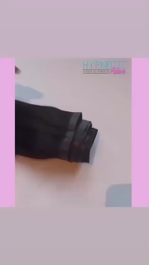 Close-up of Seamless Clip-Ins showing ultra-flat weft design. Hypnotic Hair extensions for a seamless, natural appearance.