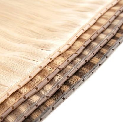 Flexible lightweight hair extensions with Hypno Genius Weft in multiple shades. Designed for seamless, durable, and natural-looking installs.