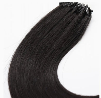 Seamless micro-link extensions in natural black shade from Hypnotic Virgin, offering a smooth, glue-free blend for natural hair enhancement.