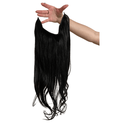 Model wearing long Halo Hair Extensions in natural black color